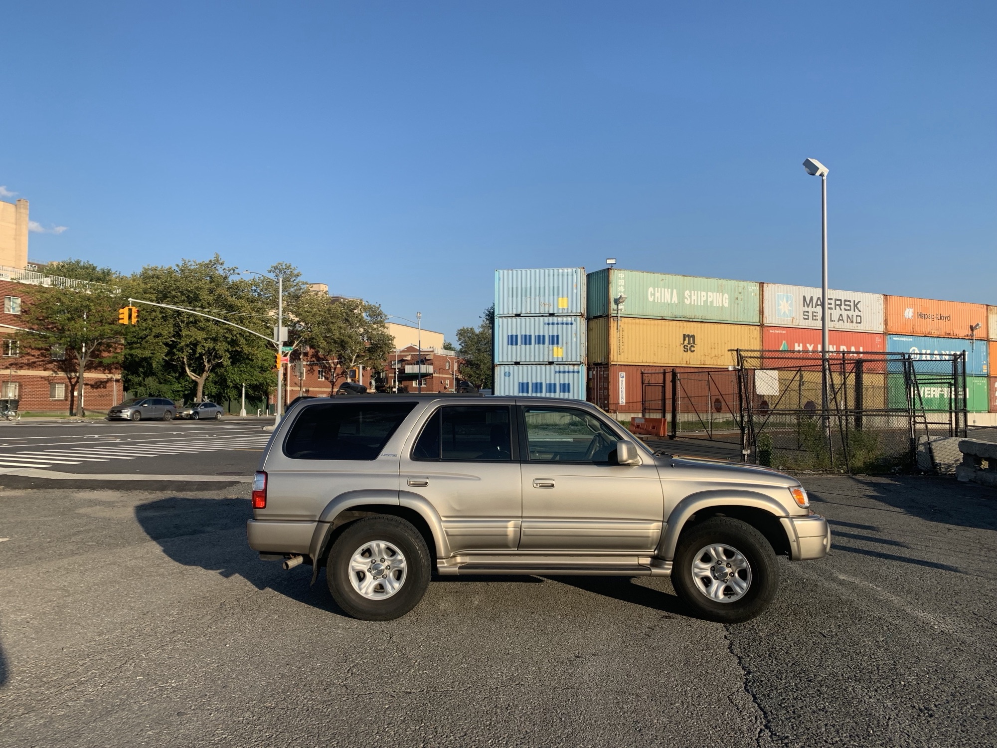 2001 Toyota 4Runner Limited parked in front of multi-colored shipping containers in Brooklyn